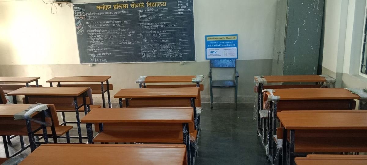 A classroom with the new benches at Manohar Hariram Chogale Vidyalay