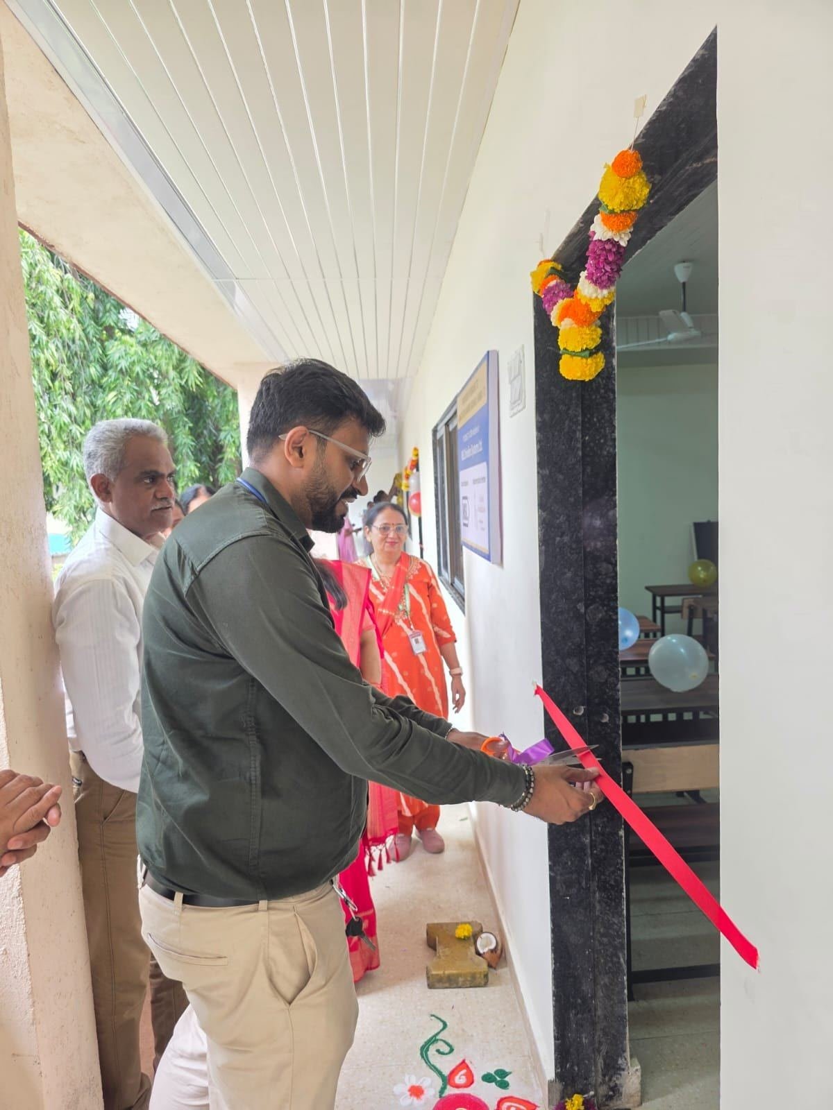 Opening the classroom with a ribbon cutting