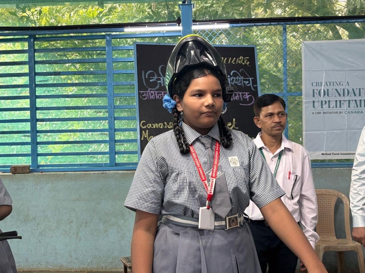 A student with her new helmet