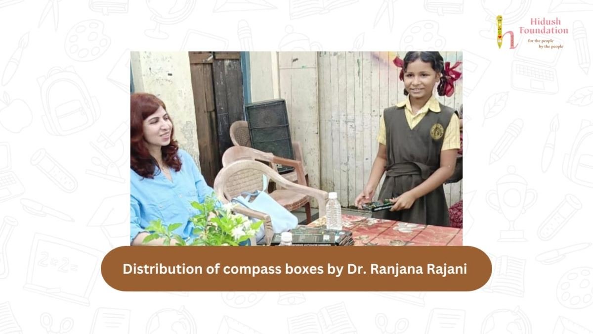 Dr. Ranjana Rajani hands out the compass boxes