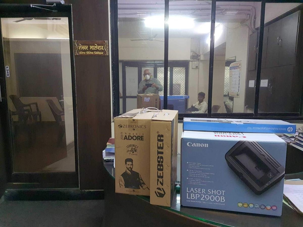 Handing Over a Computer and Printer to Malwani Police Station
