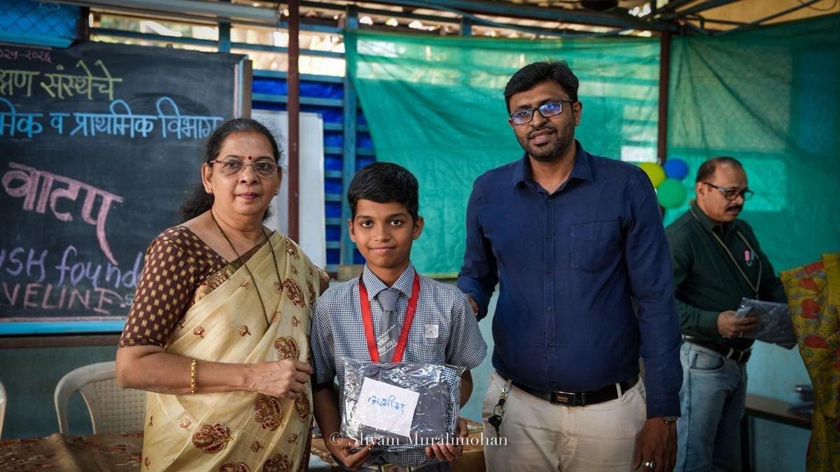 A student with his uniform and the guests