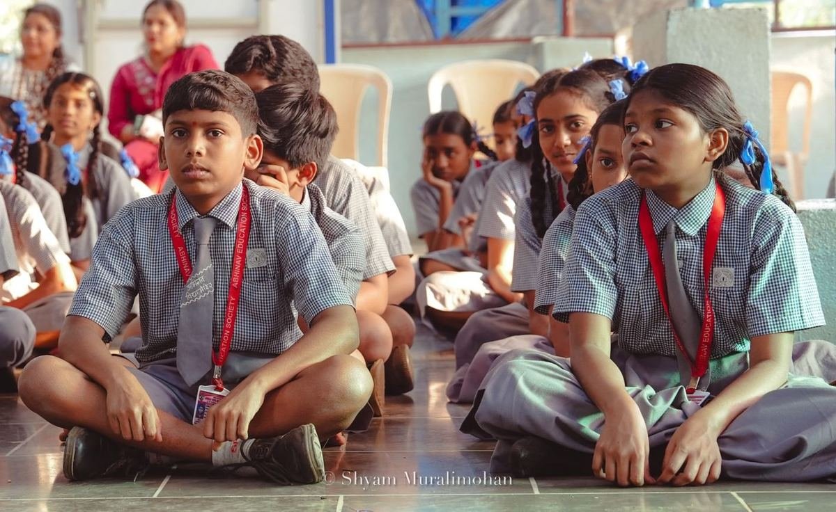 Students seated for the distribution