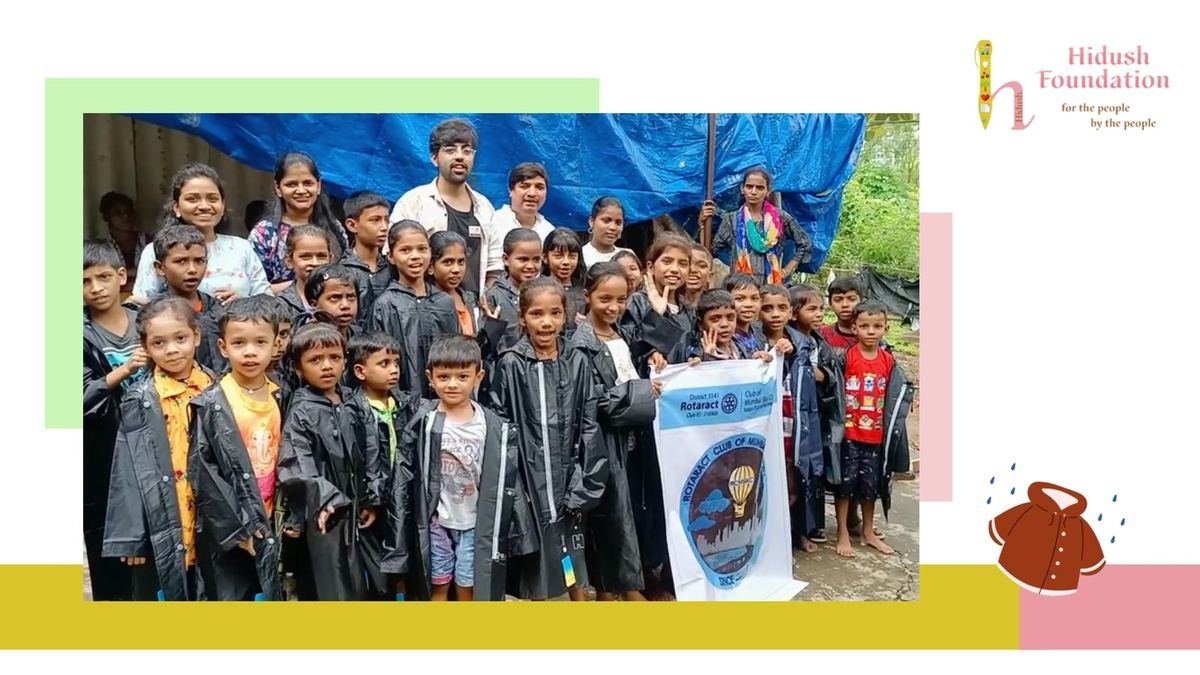 Children in their new raincoats in Bhandup