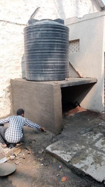 Installing the new water tank