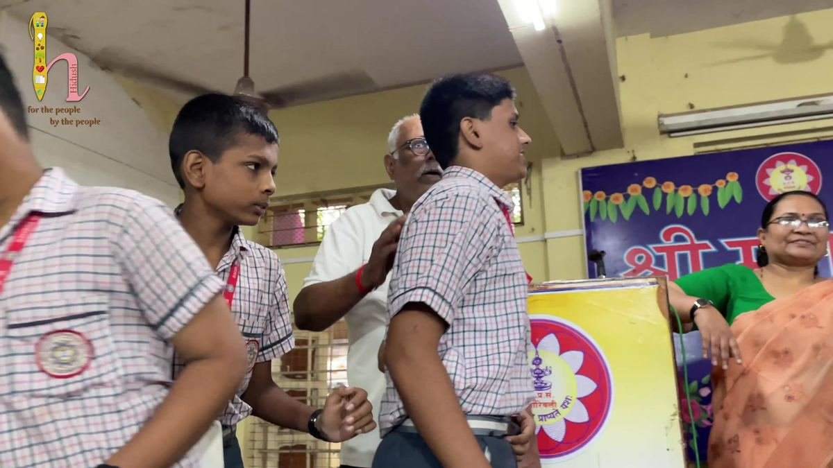 A student receives his bag