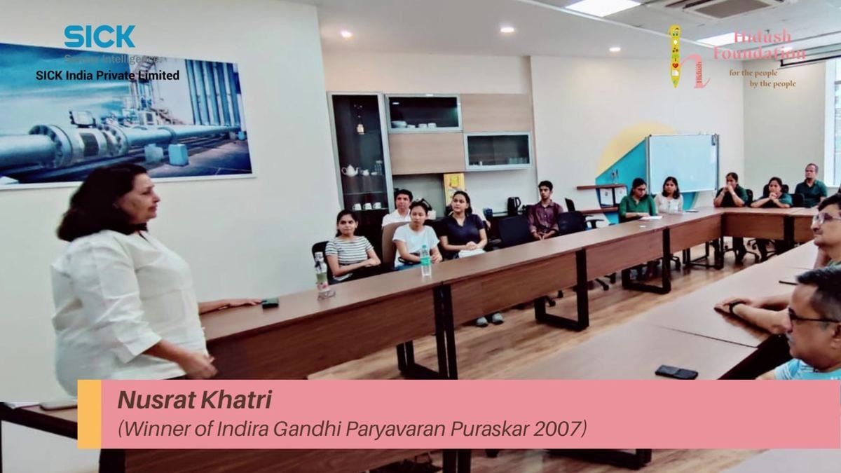 Nusrat Khatri speaks to the employees