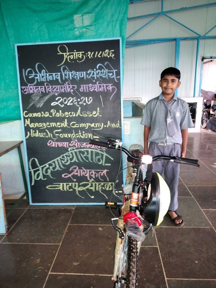 Bicycle and helmet distribution at Abhinav Vidya Mandir
